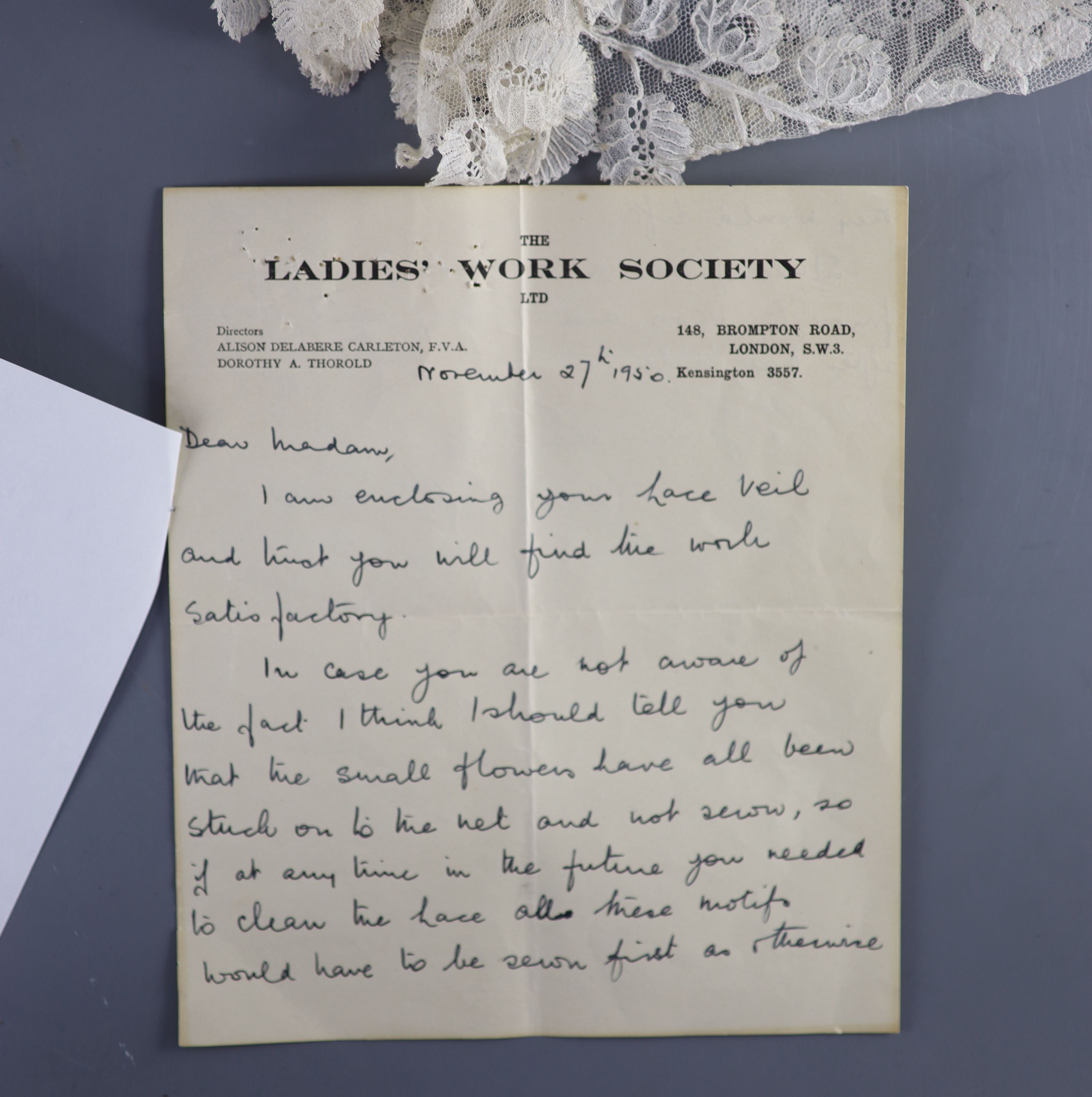 A fine 19th century bobbin lace Brussels christening veil, with letter of provenance and Ladies Society letter,